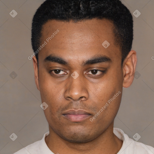 Neutral latino young-adult male with short  black hair and brown eyes