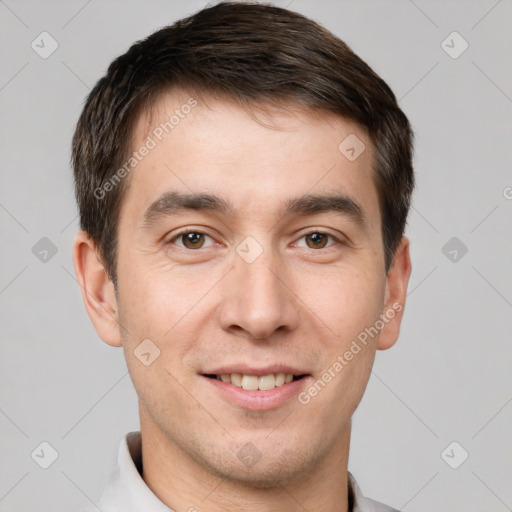 Joyful white young-adult male with short  brown hair and brown eyes