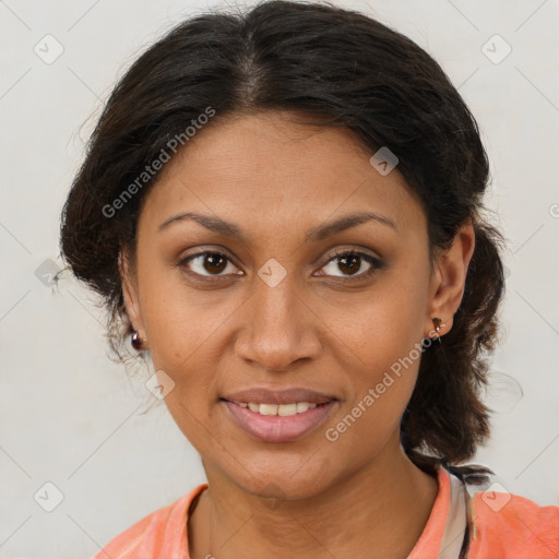 Joyful black young-adult female with medium  brown hair and brown eyes