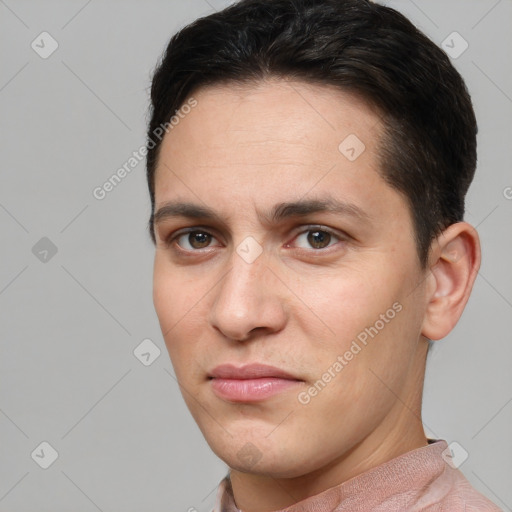 Joyful white young-adult male with short  brown hair and brown eyes