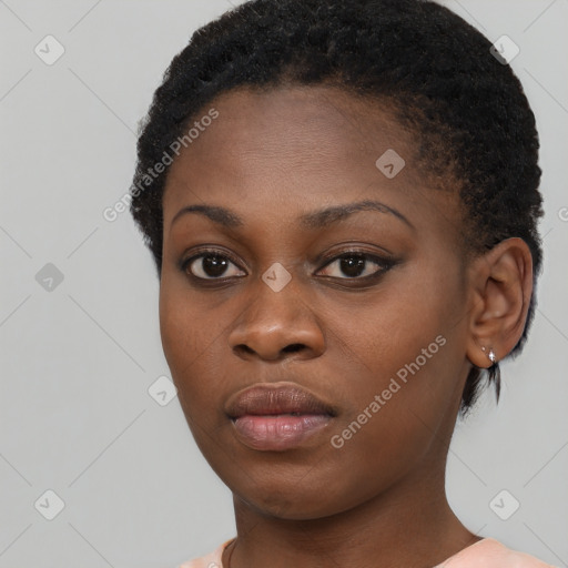 Neutral black young-adult female with short  brown hair and brown eyes