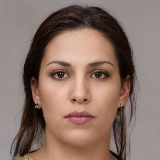 Neutral white young-adult female with medium  brown hair and brown eyes