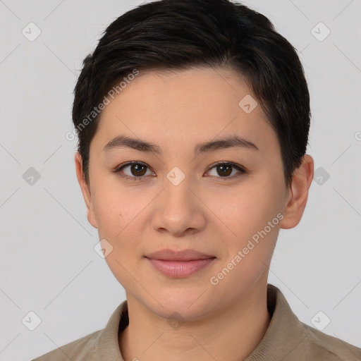 Joyful asian young-adult female with short  brown hair and brown eyes