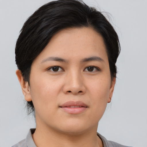 Neutral asian young-adult female with short  brown hair and brown eyes