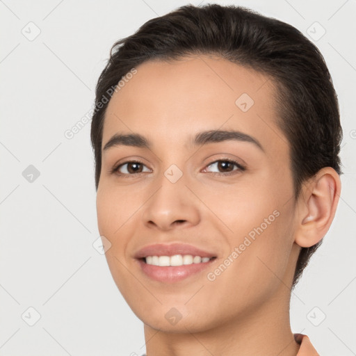 Joyful white young-adult female with short  brown hair and brown eyes