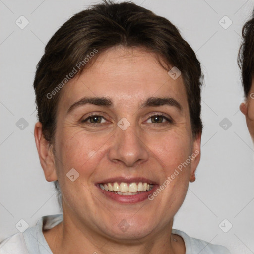 Joyful white adult female with short  brown hair and brown eyes