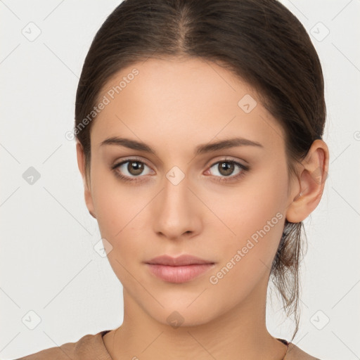 Neutral white young-adult female with medium  brown hair and brown eyes