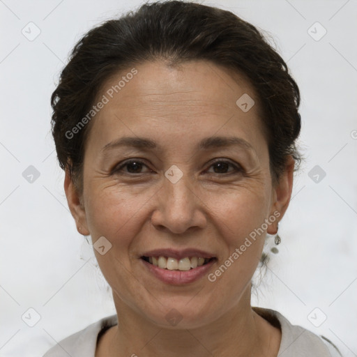 Joyful white adult female with short  brown hair and brown eyes