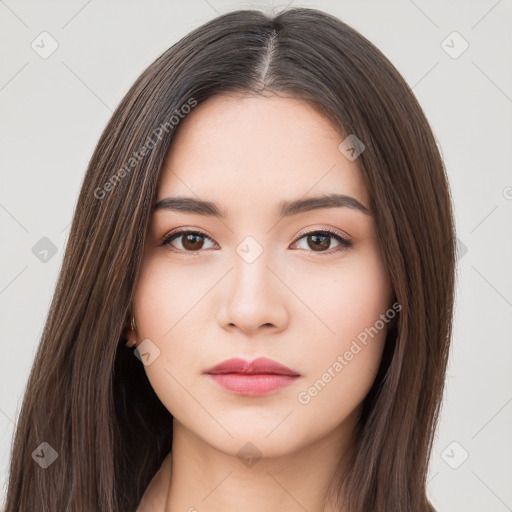 Neutral white young-adult female with long  brown hair and brown eyes