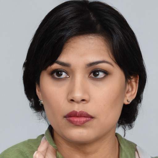 Neutral asian young-adult female with medium  black hair and brown eyes