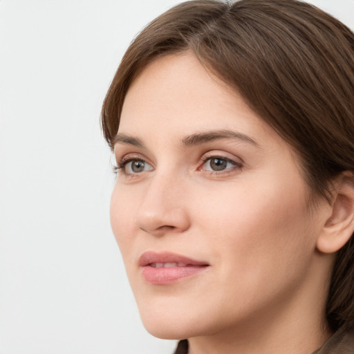 Neutral white young-adult female with medium  brown hair and grey eyes