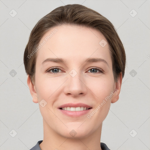 Joyful white young-adult female with short  brown hair and grey eyes