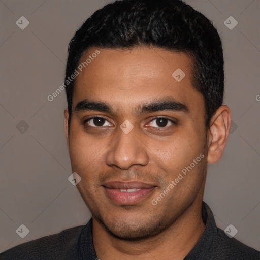 Joyful latino young-adult male with short  black hair and brown eyes