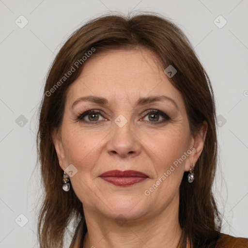 Joyful white adult female with medium  brown hair and grey eyes