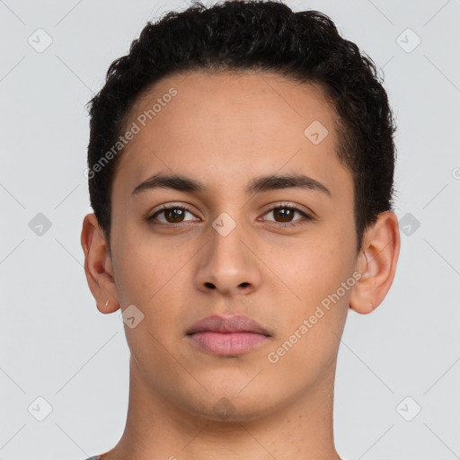 Neutral latino young-adult male with short  brown hair and brown eyes