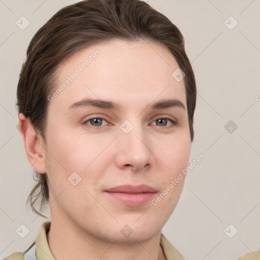 Joyful white young-adult female with short  brown hair and grey eyes