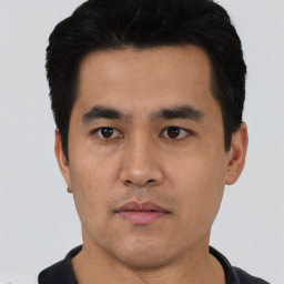 Neutral asian young-adult male with short  black hair and brown eyes