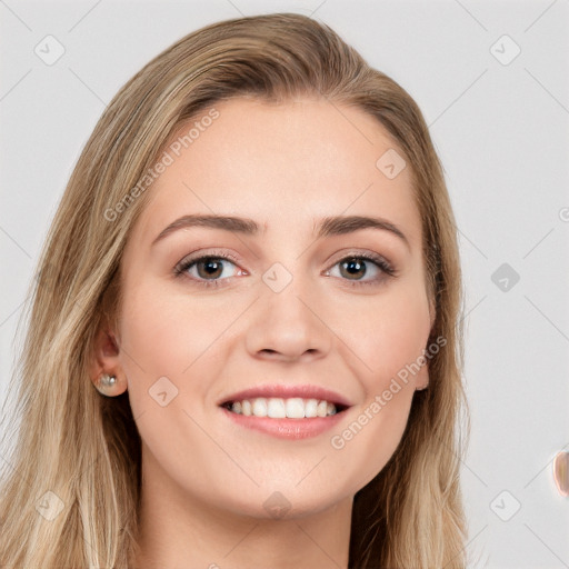 Joyful white young-adult female with long  brown hair and grey eyes