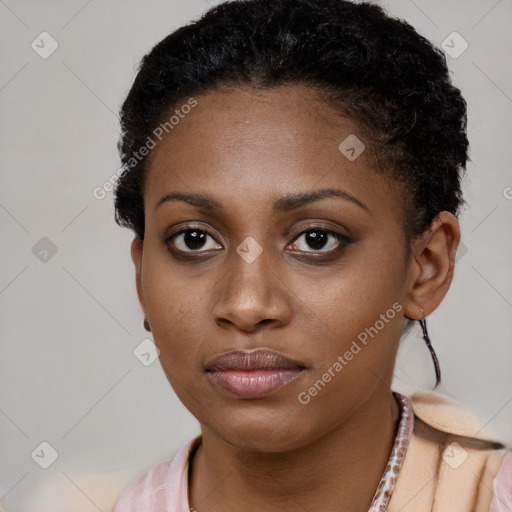 Neutral black young-adult female with short  black hair and brown eyes