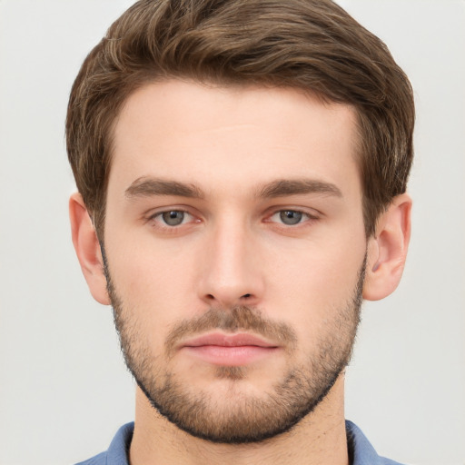 Neutral white young-adult male with short  brown hair and grey eyes