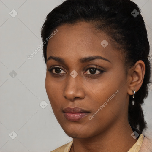 Neutral black young-adult female with long  black hair and brown eyes