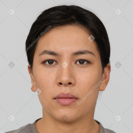 Neutral asian young-adult female with short  brown hair and brown eyes