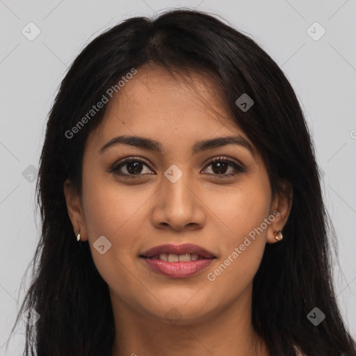 Joyful latino young-adult female with long  brown hair and brown eyes