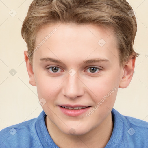 Joyful white child male with short  brown hair and brown eyes