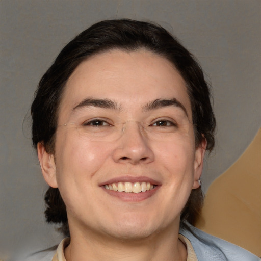 Joyful white adult male with medium  brown hair and brown eyes