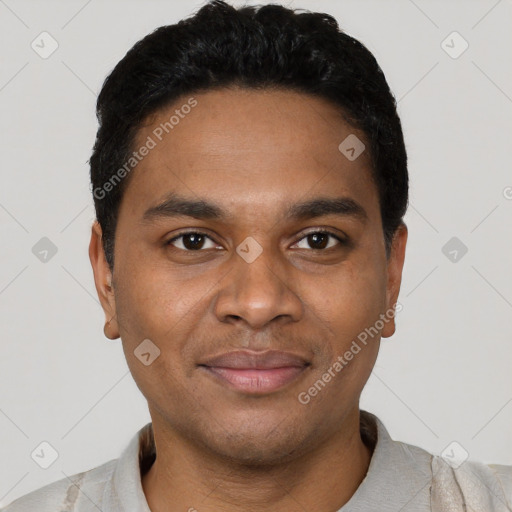 Joyful black young-adult male with short  black hair and brown eyes