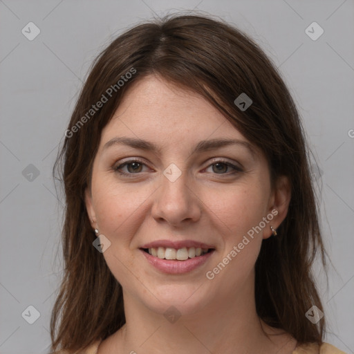 Joyful white young-adult female with medium  brown hair and grey eyes