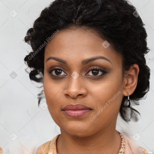 Joyful black young-adult female with long  brown hair and brown eyes