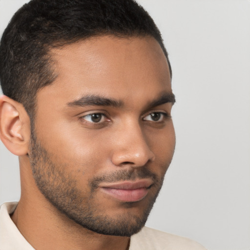 Neutral black young-adult male with short  brown hair and brown eyes