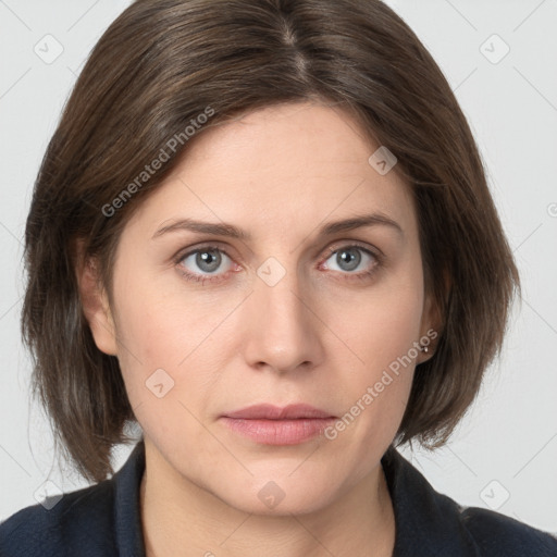 Neutral white young-adult female with medium  brown hair and grey eyes