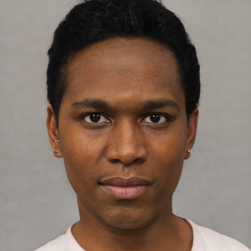 Neutral black young-adult male with short  black hair and brown eyes