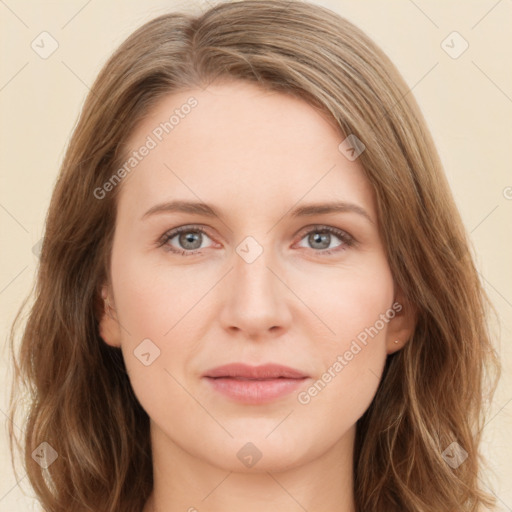 Joyful white young-adult female with long  brown hair and green eyes