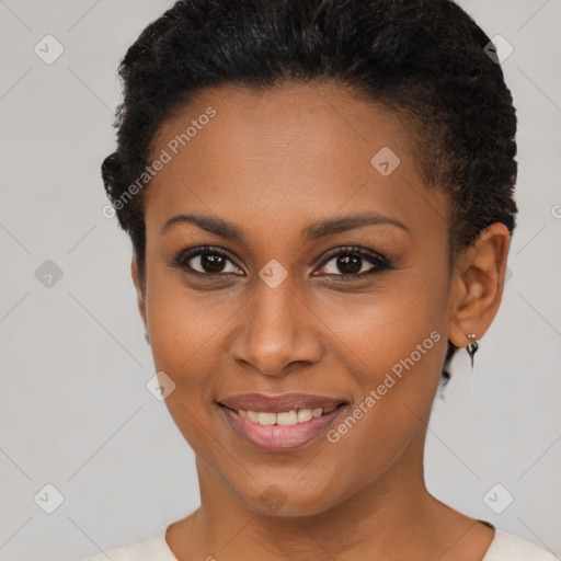 Joyful black young-adult female with short  brown hair and brown eyes