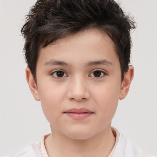 Joyful white child male with short  brown hair and brown eyes