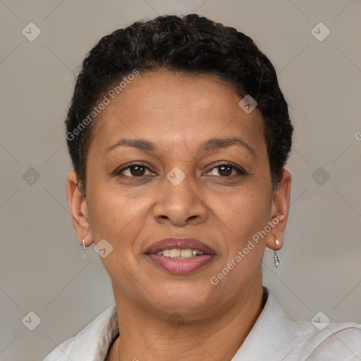 Joyful latino adult female with short  brown hair and brown eyes