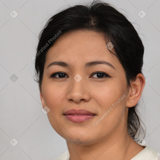 Joyful asian young-adult female with medium  brown hair and brown eyes