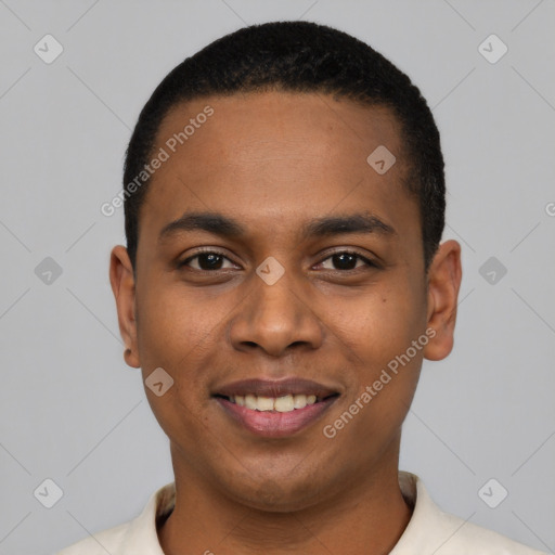 Joyful black young-adult male with short  black hair and brown eyes