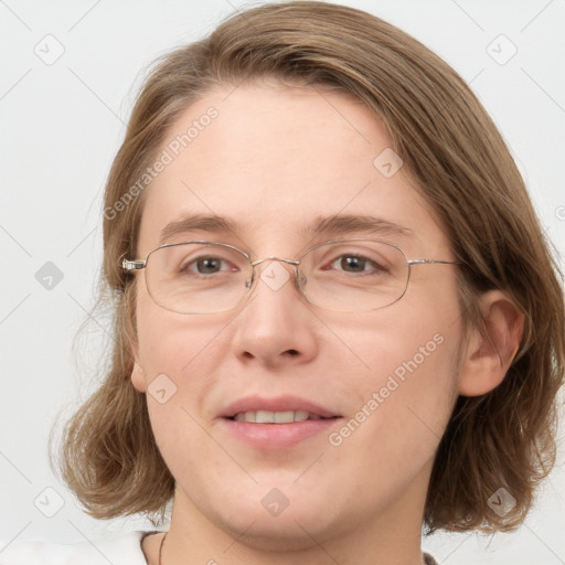 Joyful white adult female with medium  brown hair and blue eyes