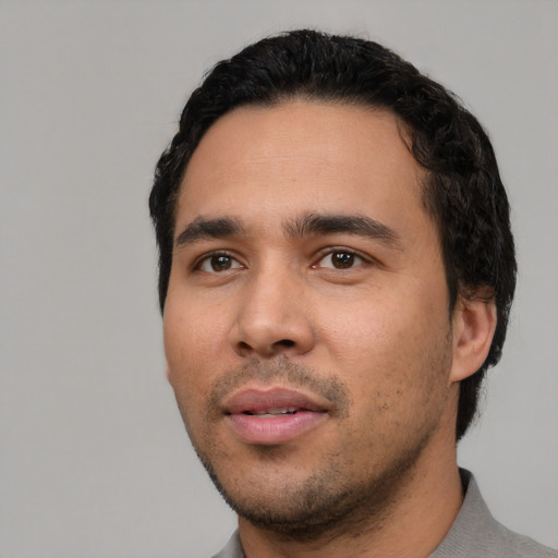 Neutral white young-adult male with short  black hair and brown eyes