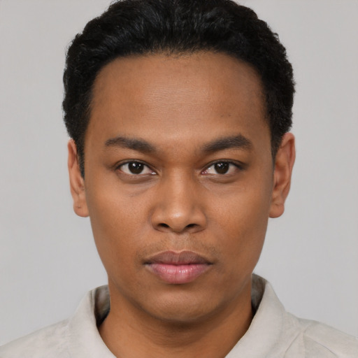 Neutral black young-adult male with short  black hair and brown eyes