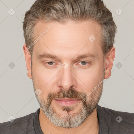 Neutral white adult male with short  brown hair and brown eyes