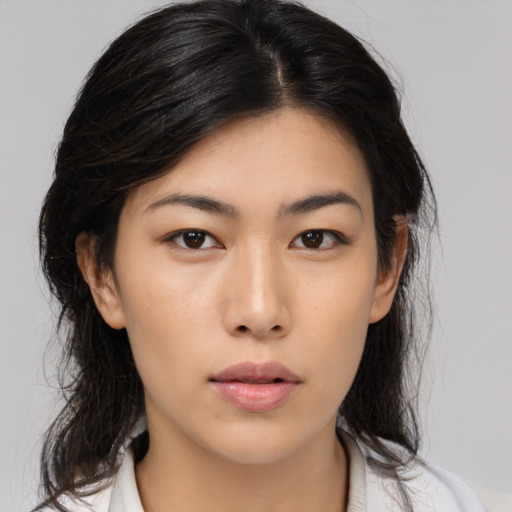 Neutral asian young-adult female with medium  black hair and brown eyes