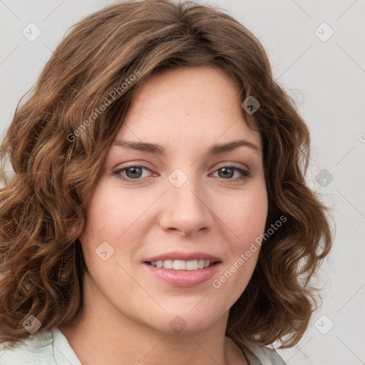 Joyful white young-adult female with medium  brown hair and green eyes