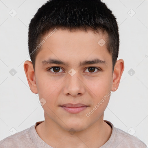 Joyful white child male with short  brown hair and brown eyes