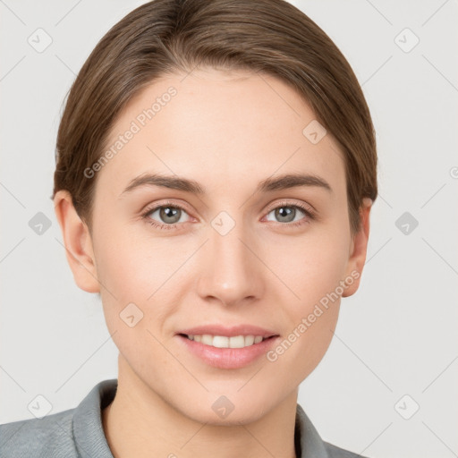 Joyful white young-adult female with short  brown hair and grey eyes