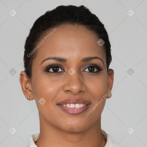 Joyful black young-adult female with short  brown hair and brown eyes